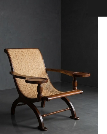 A teak and cane planter's chair